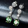 Europeu e Americano elegante quatro garras Brincos de esmeralda Simulação de baixo luxo Diamante-incrustado Brincos de Zircão Retro Brincos de cristal esmeralda