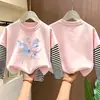 Camiseta de manga larga para niña, nuevo estilo primavera/otoño 2026, base infantil moderna y linda, conjunto de otoño de algodón puro, top tipo dos piezas
