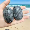 Piedra de Cristal Natural Llama Piedra de Mano Pulida Muestra Piedra Ovalada de Masaje Piedra para Alivio del Estrés de la Palma Venta al por Mayor