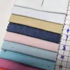 Denim Imitación Elástico de Poliéster-Algodón de 21 Conteos Asequible del Fabricante 220g Hilo de Satén Denim Sin Lavado Diagonal Derecha 75C22T3Sp