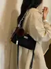 Bolso cruzado de diseño nicho de moda casual transfronterizo, estilo japonés y coreano, bolso de axila tipo "bollo" para mujer, bolso de hombro cruzado estilo coreano para commuting