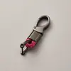 Llavero de cuerda trenzada de fábrica, accesorios de ferretería, hebilla de herradura, colgante para llave de coche, accesorios de moda para coche