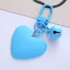 Nuevo llavero de color caramelo con forma de campana de amor, lindo para chica, corazón de chica, corazón de melocotón, funda para auriculares, colgante para bolso, en stock, venta al por mayor
