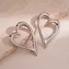 Pendientes de Acero con Forma de Corazón Lisos Transfronterizos Europeos y Americanos, Pendientes Dorados Estilo Coreano Estilo Ins, Lujo Ligero, Gama Alta, Pendientes Versátiles