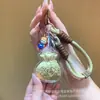 Bolsa de la Suerte Dorada Colgante para Teléfono Móvil Pequeños Accesorios de Joyería Llavero Cadena de Dibujos Animados Lindos para Teléfono Móvil Colgante Venta al por Mayor