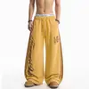 Calça de moletom casual larga e despojada com estampa de leopardo, estampa de letras e listras, estilo de rua americano, subcultura, para homens e mulheres