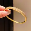 Pulsera ovalada de circonita chapada en oro real de 18K 2026 nueva exquisita de moda para muñeca joyería de lujo ligero de alta gama