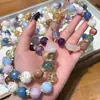 [Qiaoen] Pulsera Duobao de Caramelo de Suerte Natural Polvo de Cinco Elementos Cristal Rosa Diseño Joker Sentido del Diseño Lote de Pulseras