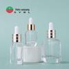Frasco pequeno marrom de 15ml 25ml 40ml frasco de essência facial frasco quadrado com fundo de grade transparente frasco para líquidos