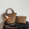 Bolsa de Mão de Primavera Estilo Coreano para Mulheres 2025 Nova Moda Bolsa Saco com Padrão de Lichia Bolsa Transversal Versátil