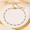 Moda Primavera Creek personalidad acero inoxidable gota de pegamento negro pequeña cuenta de arroz tobillera oro joyería al por mayor JC-150
