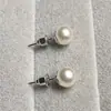 8 Pendientes Redondos de Perlas de Imitación de Alto Brillo 2025 Nicho Simples Versátiles Pendientes para Mujer Joyería Venta al por Mayor No