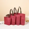 Bolsas Não Tecidas em Estoque Atacado Bolsas Ecológicas Logotipo Personalizado Espessadas Loja de Roupas Publicitárias Sacolas de Presente Não Tecidas
