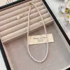 Collar de Perlas de Cristal para Mujer, Cadena de Clavícula Trendy de Lujo Ligero de Nicho, Accesorio de Cuello Elegante de Gama Alta con Diseño de Tirar
