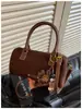 Bolso de mano retro de cuero esmerilado europeo y americano 2025, bolso de hombro de cuero PU moderno para mujer, bolso cruzado de alta calidad de moda