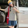 Conjunto de Camisetas de Manga Curta para Meninas Verão 2026 Novo Conjunto de Duas Peças com Shorts Jeans Listrados para Meninas Mais Velhas Roupa de Verão Infantil