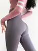 Pantalones de Yoga Deportivos Elásticos de Cintura Alta Ajustados Sin Costuras Populares Europeos y Americanos Personalizados Transfronterizos para Fitness Reafirmantes del Vientre Levanta Glúteos