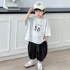 Pantalones de Verano Jacquard para Niños Conjunto Delgado 2026 Nuevo Estilo de Verano Atuendo Fresco de Dos Piezas de Manga Corta para Bebé Moderno