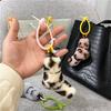 Estampa de Leopardo Nó Torcido Moda Feminina Pingente de Bolsa Criativo Chaveiro de Carro Bolsa Fofa Pelúcia Capa de Celular Acessórios
