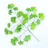 Suministro de fábrica ramas de simulación hojas de ginkgo decorativas ramas falsas plástico plantas verdes grandes Red popular venta al por mayor