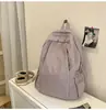 Mochila Pequena Estilo Preguiçoso Ins Coreano de Aparência Sofisticada Leve Cor Pura Simples Repelente à Água Mochila Casual para Viagem
