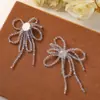 Moda Corea del Sur Bordado a Mano Cuentas Borla Flor Tela Pegatina DIY Zapatos Flor Accesorios para el Cabello Tocado Broche Ropa Parche Parche