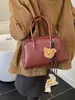 Bolsa de almohada de diseño de nicho de comercio exterior 2026 Otoño e Invierno Nuevo estilo Bolso de hombro Elegante Versátil Bolso cruzado Moderno Bolso pequeño