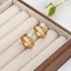 Anel Novo de Aço Titânio Transfronteiriço para Mulheres, Anel de Casal com Diamantes Incrustados em Aço Inoxidável, Design de Nicho, Anel de Proposta Personalizado Atacado