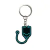 Llavero de Dibujos Animados Médico PVC Goma Suave Cara Pequeña Llavero Bolsa de Doctor Ropa Auricular Colgante Regalo Pequeño DIY
