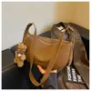 Bolso de mano tipo dumpling de diseño nicho transfronterizo, nuevo bolso de axila casual y moderno para mujer, adecuado para el trabajo y los desplazamientos, bolso de hombro, bolso cruzado, moderno