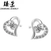 Pendientes chapados en plata y cobre al por mayor de fábrica, pequeños pendientes de moda coreana con forma de corazón para mujer, pendientes chapados en plata