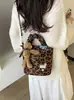 Bolsa Feminina de Ombro Único Estampa de Leopardo Retrô Fashion 2026 Nova Grande Capacidade Simples Versátil para o Dia a Dia Bolsa Tote de Axila Yuezi