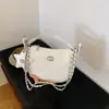 Bolso estilo Chanel de estrella y luna para mujer, nuevo modelo 2026, bolso de axila de nicho de lujo ligero, bolso de cadena acolchado, bolso de mano y bolso cruzado