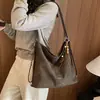 Bolso de Hombro Nuevo de Ante Otoño/Invierno 2026 Versátil Simple Estampado de Leopardo Bolso Tote Moda Viaje Diario Mochila Casual