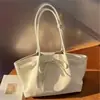 Bolso de mano de nicho de alta gama coreano, bolso tote de gran capacidad, lazo de moda, bolso dulce para el hombro