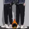 Calças casuais masculinas de outono e inverno, corte solto, tamanho grande, calças de moletom com punho, calças masculinas de veludo cotelê, versáteis, simples, calças compridas com forro de fleece