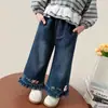 Novos jeans de outono para crianças com babados, comércio exterior 2026, versão coreana, calças largas infantis para meninas, disponíveis para dropshipping