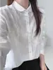 Camisa blanca de estilo dulce francés con cuello de muñeca bordado para mujer, de manga larga, con un elegante diseño de retazos de encaje y tela jacquard