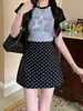 Falda de lunares color albaricoque estilo nuevo 2026 para mujer, falda de línea A ajustada para primavera y otoño, de cintura alta, adelgazante, versátil falda corta casual