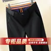 Comercio Exterior Exportación Otoño/Invierno 2026 Nuevo Estilo Pantalones Casuales de Lana para Hombre Pantalones de Pierna Recta de Seda Pantalones de Traje de Negocios para Personas de Mediana Edad