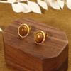 2024 Nuevos Pendientes Ovalados de Piedra Ojo de Tigre Diseño Retro Único Pendientes Únicos de Acero de Titanio para Mujer Fabricante Venta al por Mayor