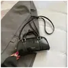 2026 Nuevo Modelo Bolso de Hombro Texturizado de Color Sólido de Moda Elegante para Mujer Bolso Boston de Moda Bolso Cruzado de Moda