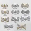Venta al por mayor Joyería de Circonita para Manicura Pajarita Accesorios para la Punta del Dedo Lujo Ligero Oro y Plata Diamante Decoraciones de Uñas Portátiles