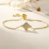 Pulsera de Lujo Ligero de Alta Gama para Mujer Aogu, Cobre Chapado en Oro de 18 Quilates con Incrustaciones de Circonita, Diseño de Flor Hueca, Suministro de Comercio Exterior