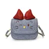 Bolsa infantil transfronteiriça 2026 outono e inverno nova bolsa de sela mini fofa de desenho animado com gatinho e laço bolsa transversal