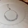 Pulsera Flor de Circonita Chapada en Oro Real Nicho Dulce Versátil Pulsera Temperamento Lujo Ligero Joyería de Gama Alta para Mujeres Al Por Mayor