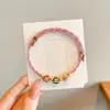 Pulsera de Hilo Rojo de Bebé de Dibujos Animados 2026 Nuevo Estilo Bendición Pequeño Zongzi Pulsera Estilo Chino Festival del Bote del Dragón Hilo de Cinco Colores Ajustable Venta al por Mayor