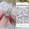 Accesorios al por mayor para Nail Art Diamante Transparente de Fondo Puntiagudo Super Flash Gran Corazón Torcido Hacha Gota de Agua Cuadrado Gordo Mariposa Diamante Blanco Accesorios para Uñas