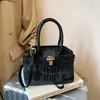 Bolsos de mano de alta gama para mujer, primavera 2026, nuevo estilo, bolsos versátiles, modernos, de nicho, texturizados, con bordado de letras, bolso de hombro