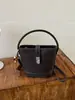 Bolso de Mano Nuevo para Mujer Primavera 2025: Bolso tipo cubo de alta gama, moderno, versátil, simple, Bolso cruzado de hombro de nicho